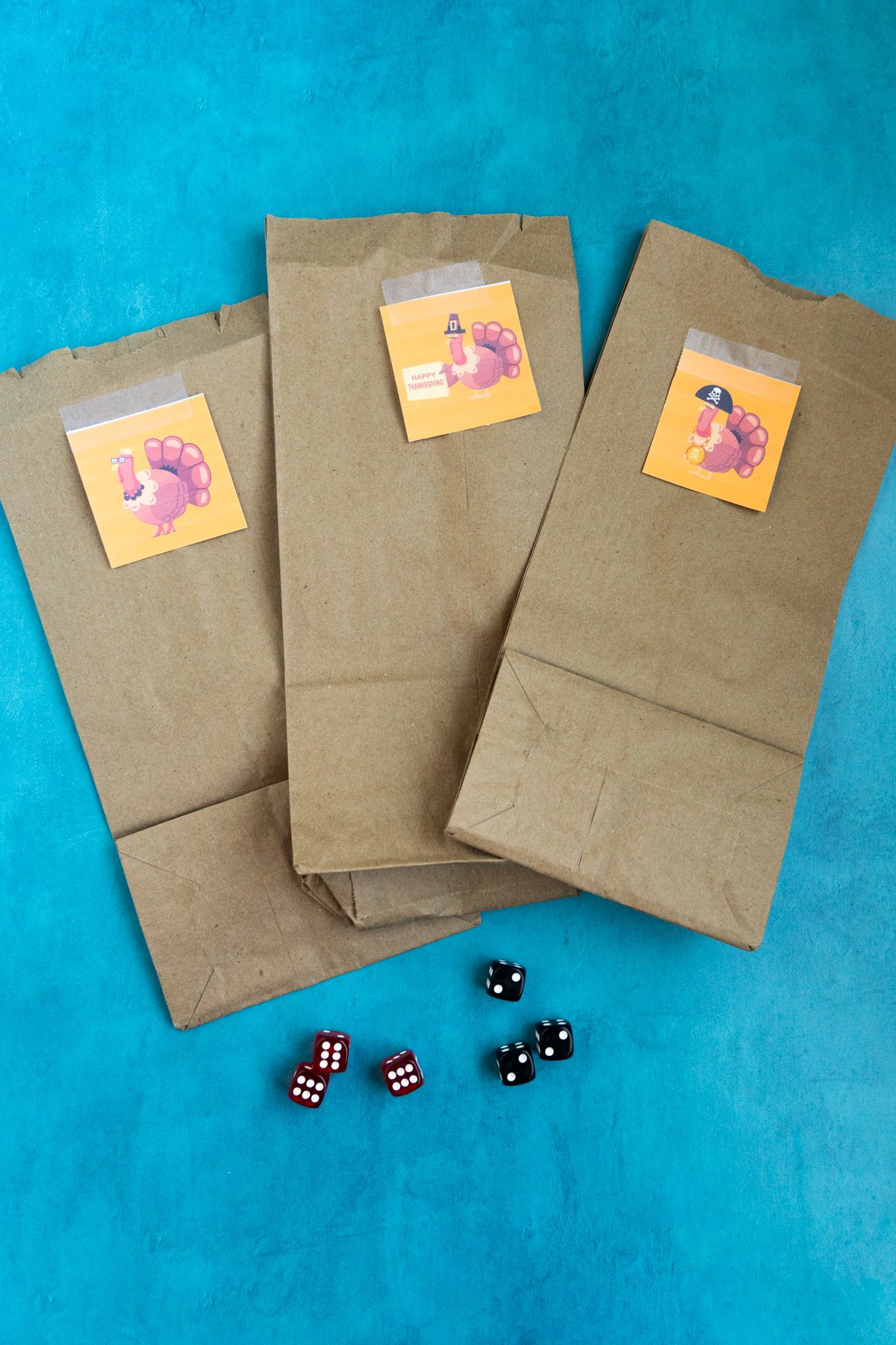 three paper bags with turkey pictures on them