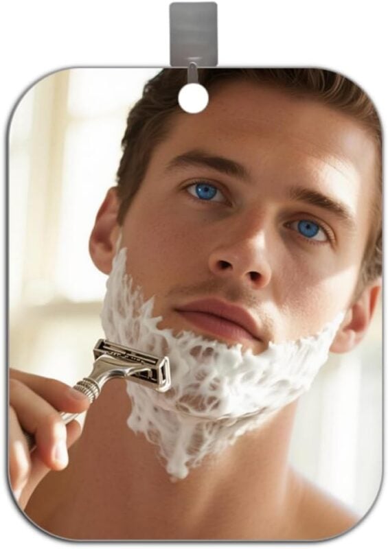 man shaving in a mirror