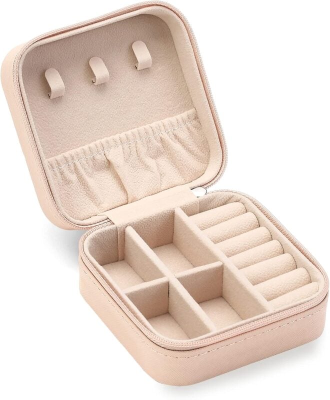 cream colored travel jewelry case