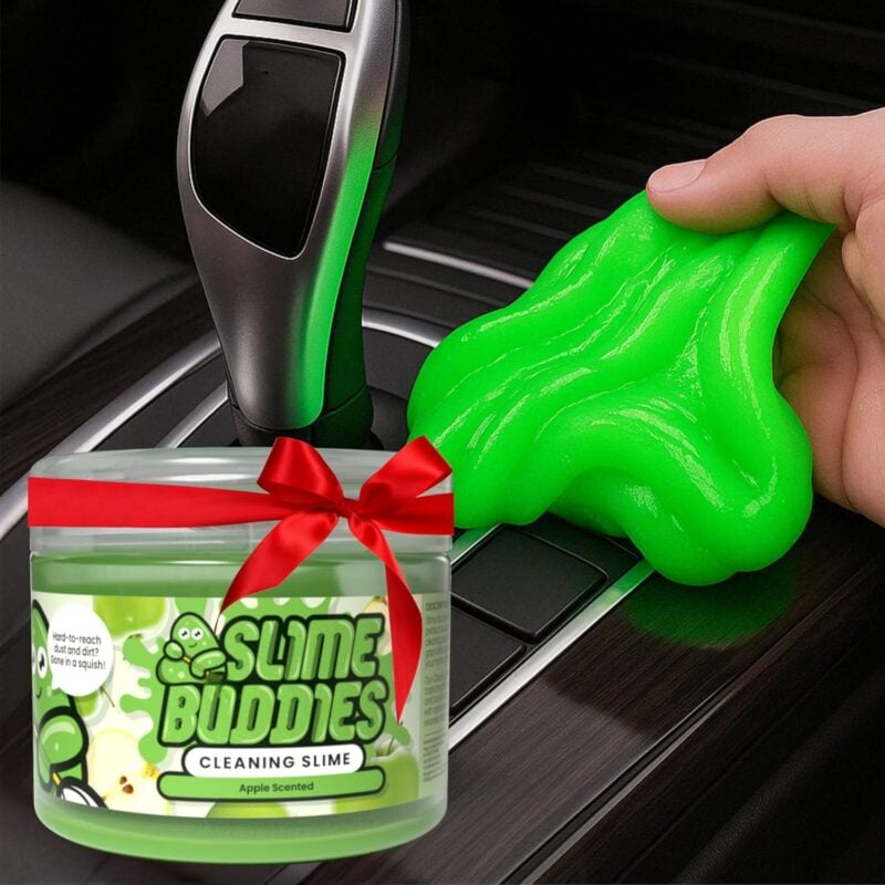 hand holding some cleaning slime in a car