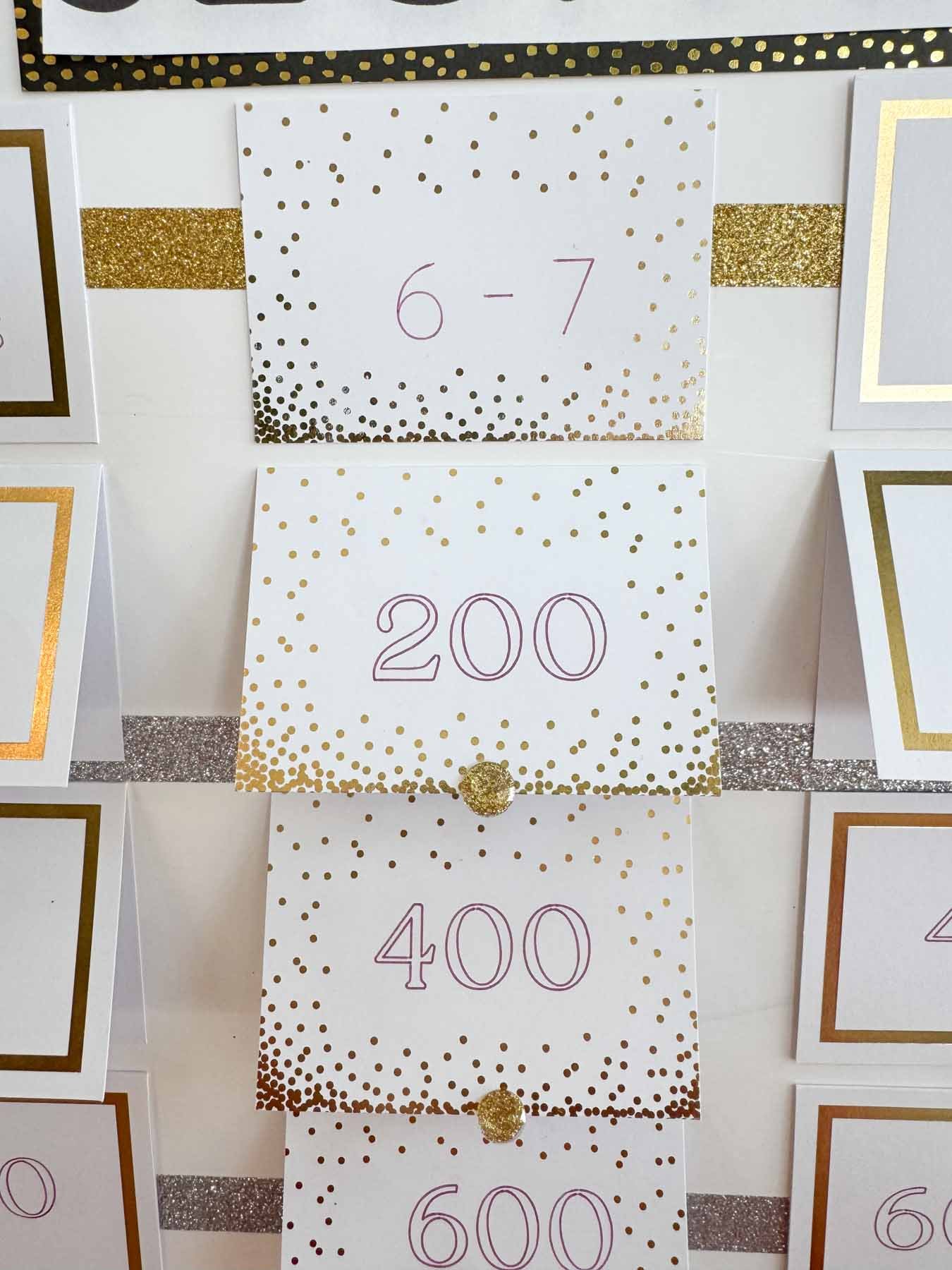 6-7 Jeopardy question category on a New Year's Eve Jeopardy board