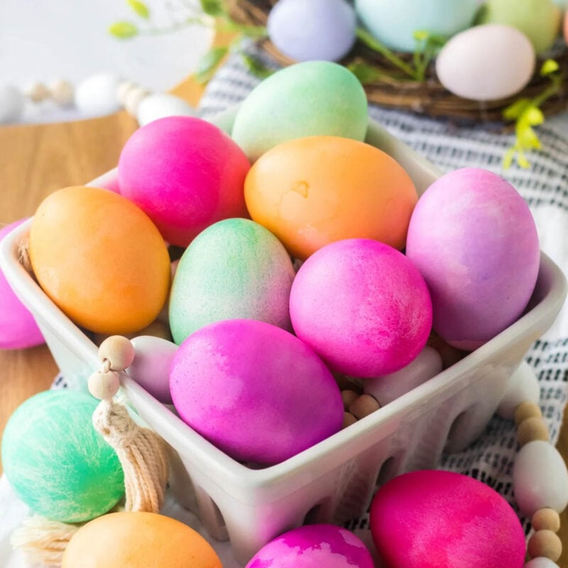 container of various colored easter eggs