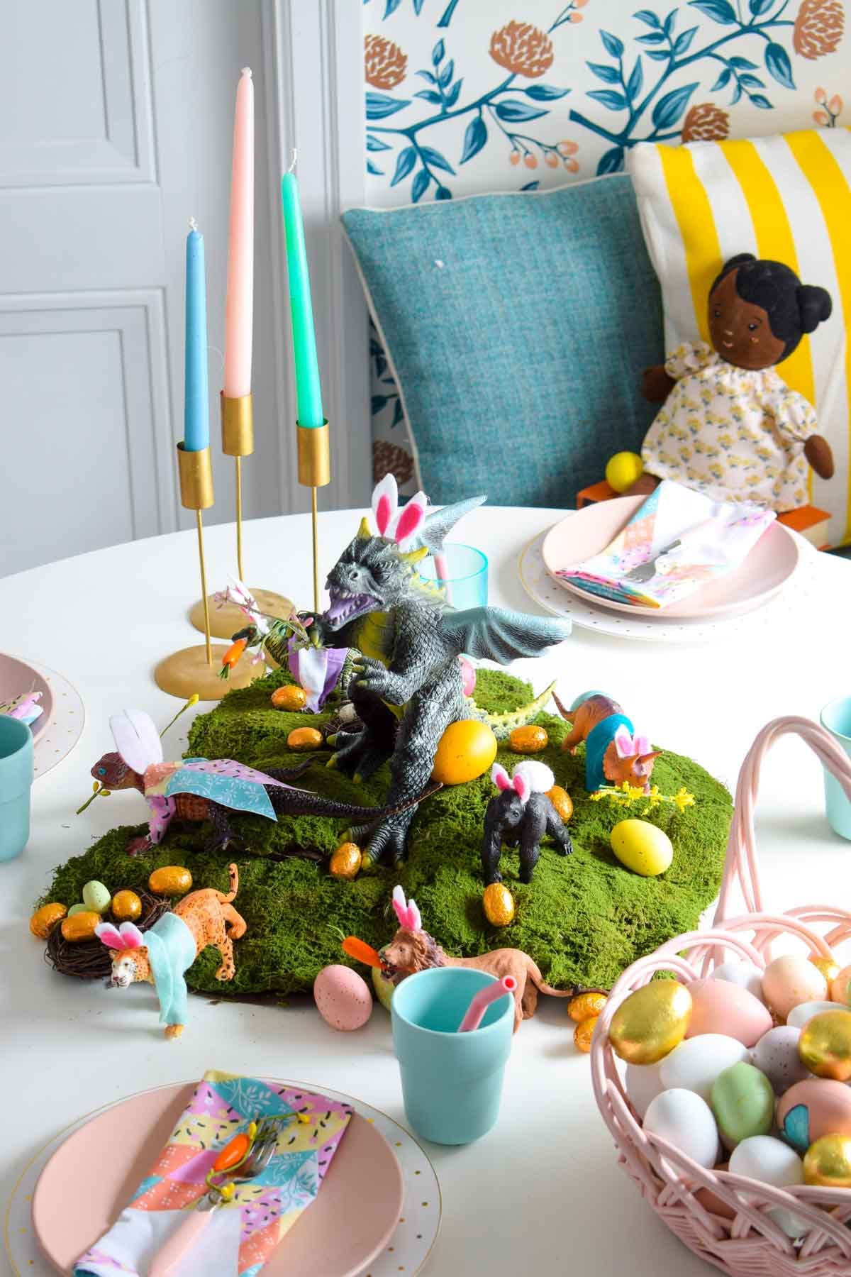 kids' Easter table with various toys with bunny ears on