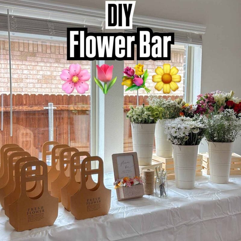 bags and flowers set up on a table