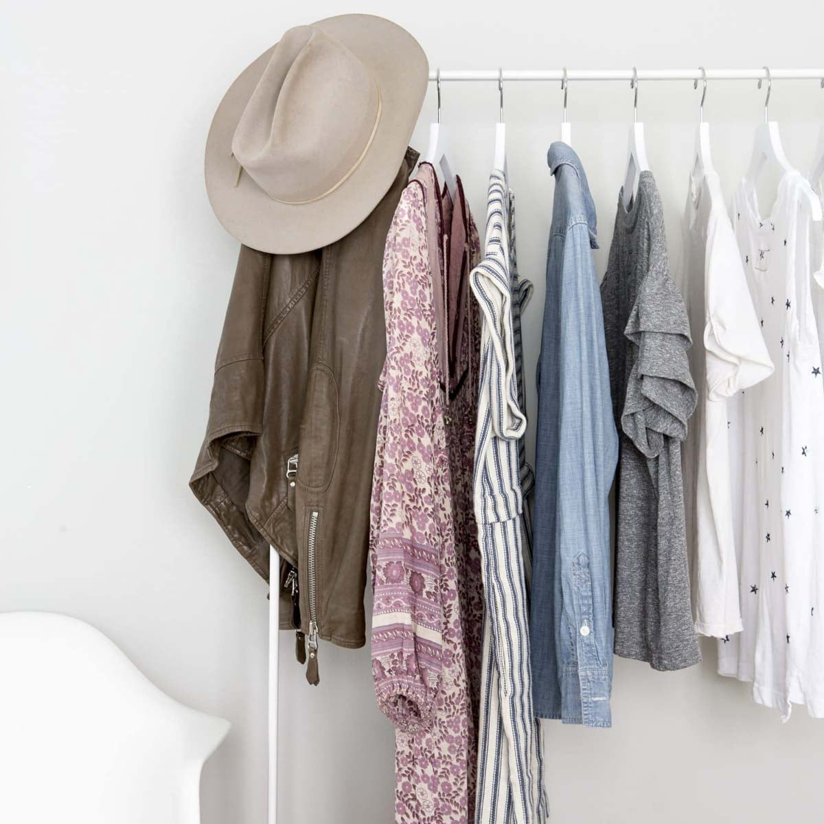 clothing rack with various different used clothing items