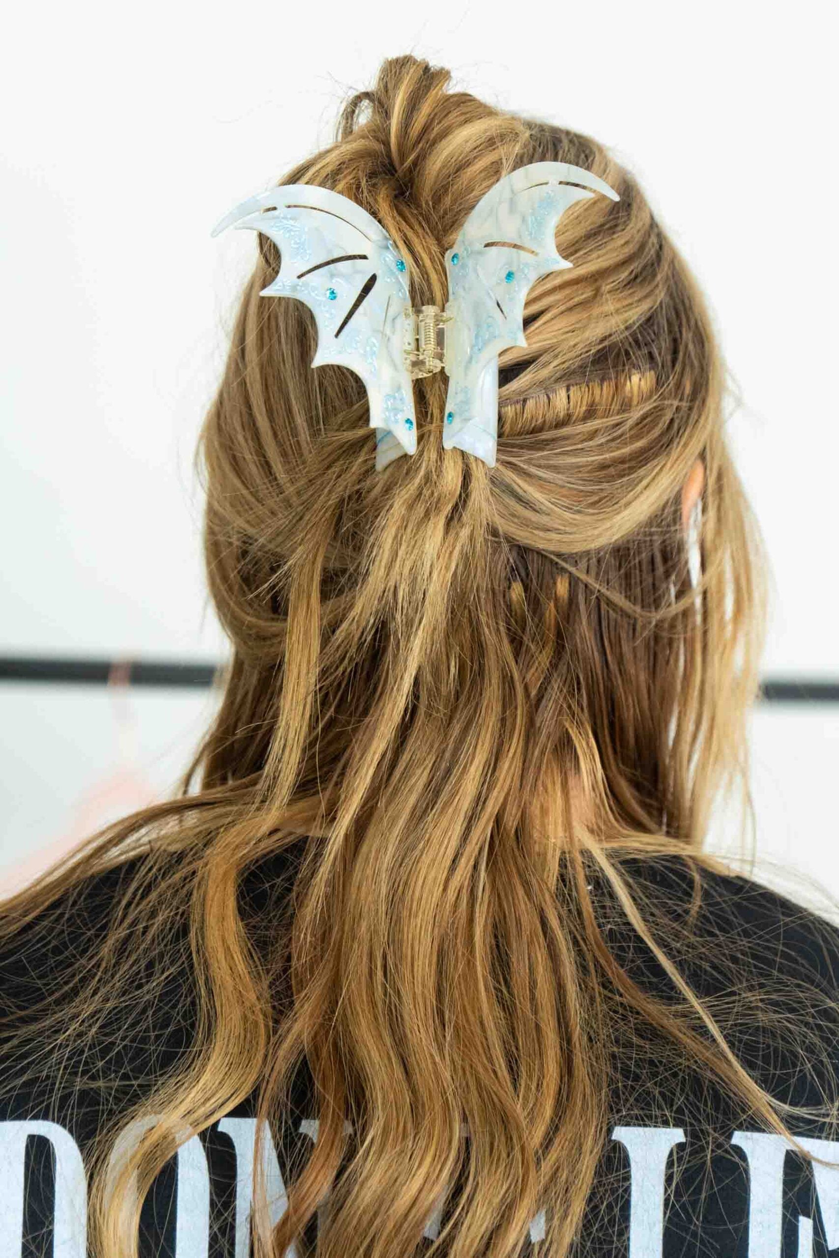 woman with a bat hair clip in her hair