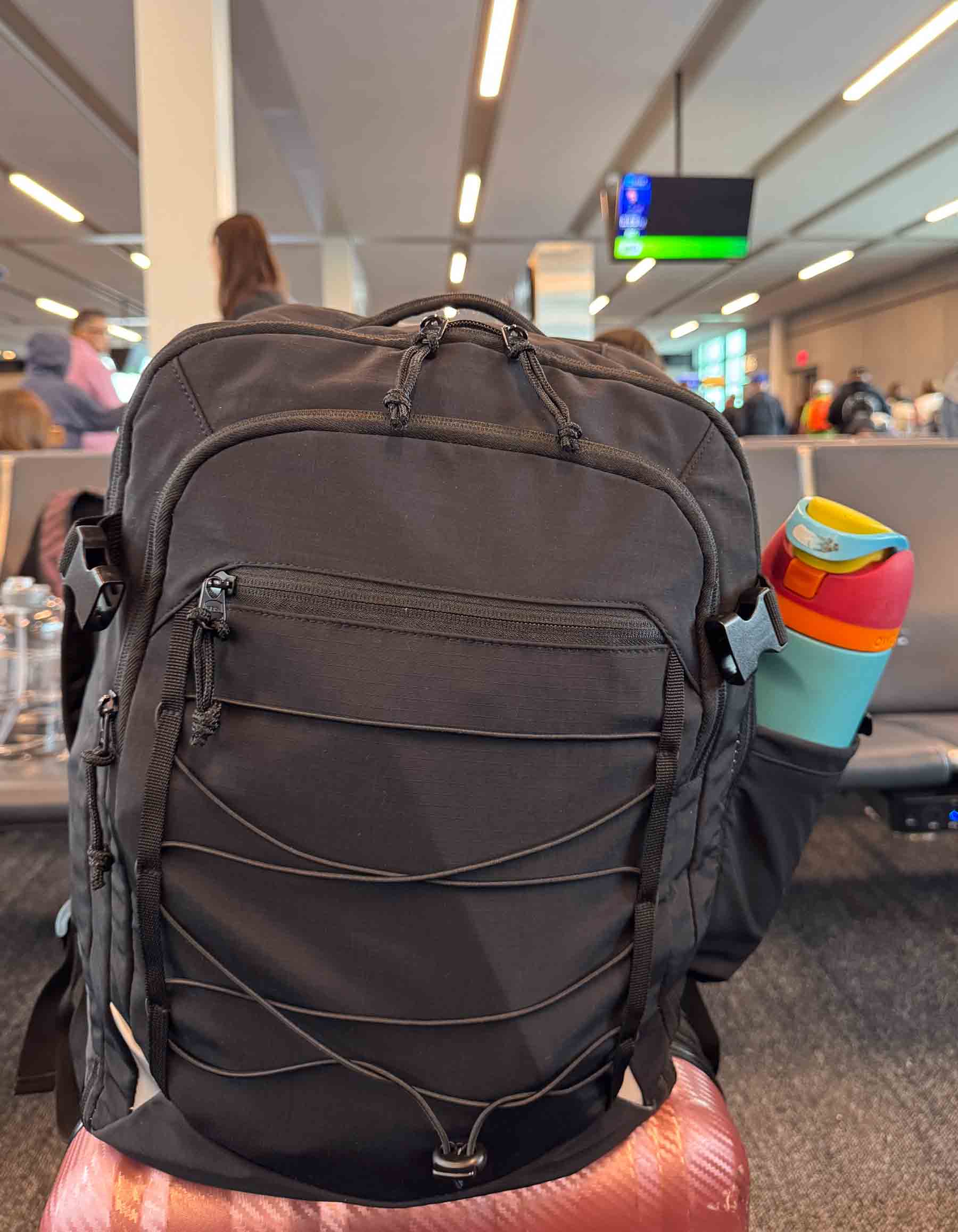 bag on top of a suitcase