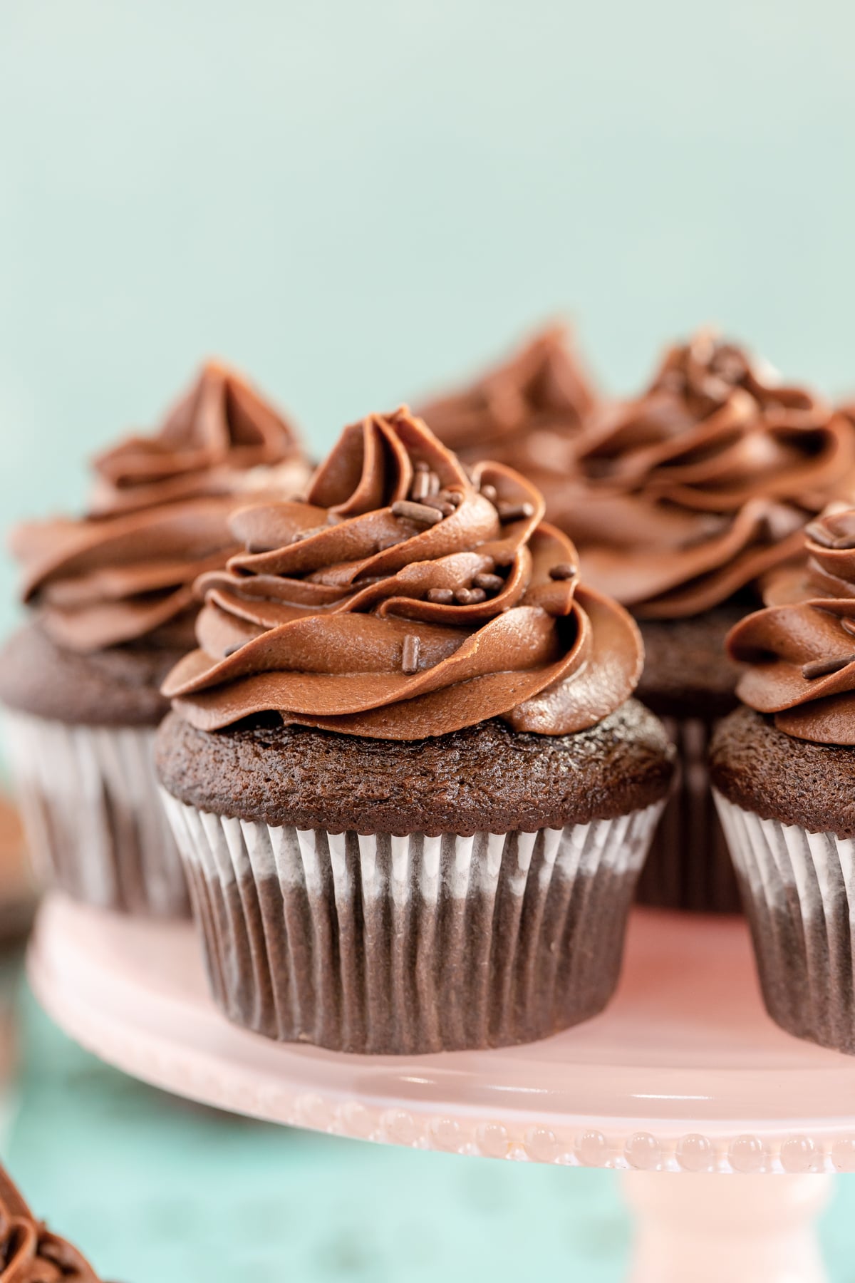 chocolate cupcakes on a cake stand