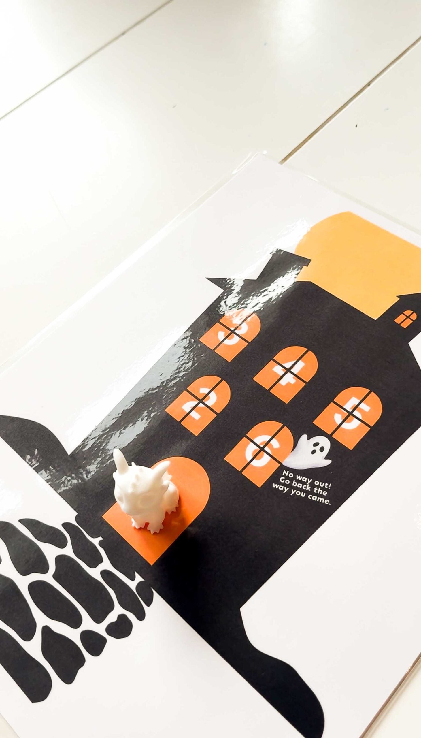 haunted house printout with a 3D dragon on it